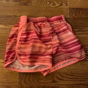Orange and red youth athletic shorts